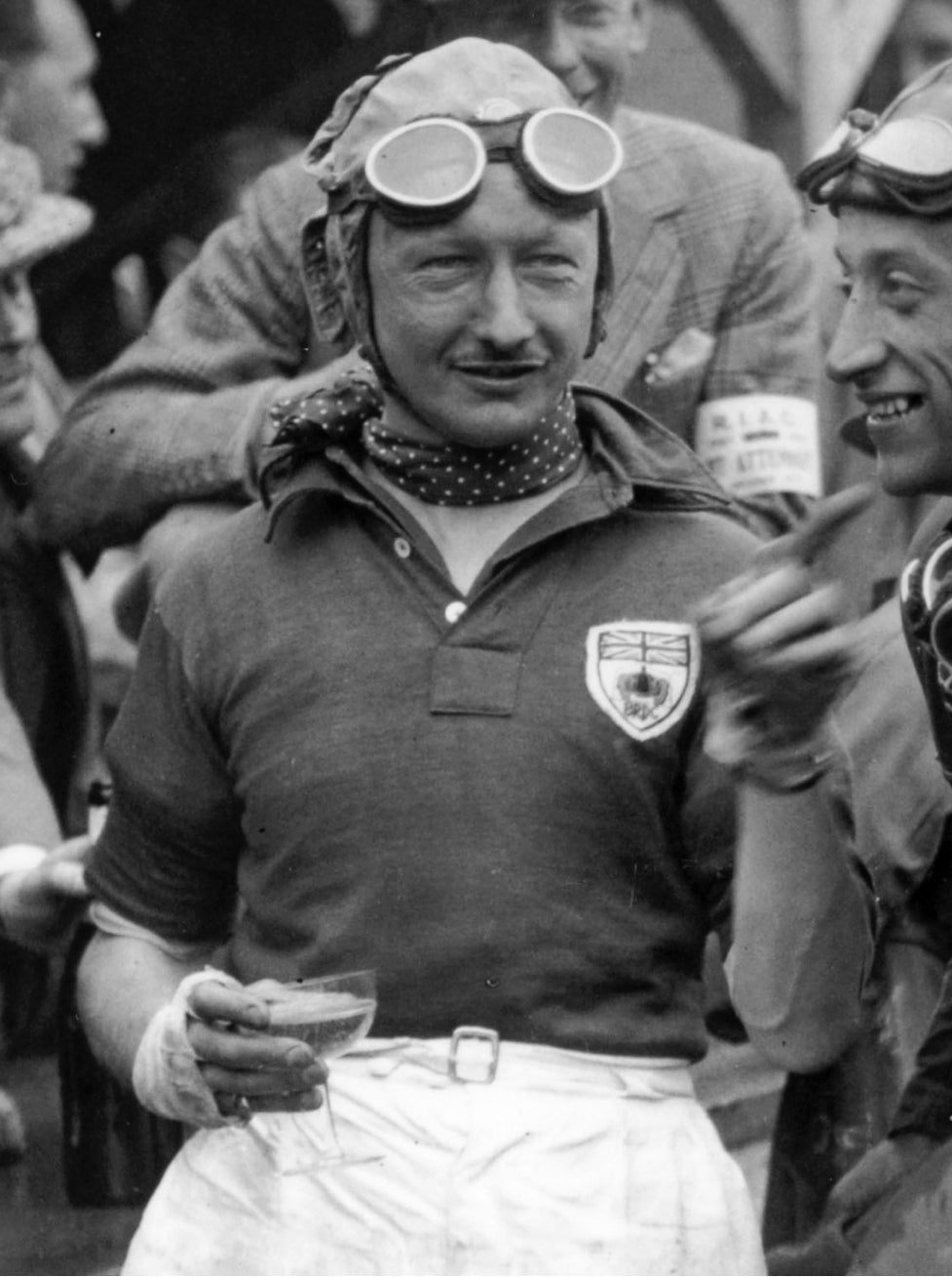 <strong>MAN WITH A PLAN</strong><br/><span>Sir Henry Birkin, the former fighter pilot who pushed Bentley to build the Blower at tremendous cost to the carmaker, raises a victory glass of champagne.</span>